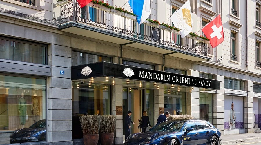 Entrance and Mandarin Oriental Savoy hotel signage in central Zurich