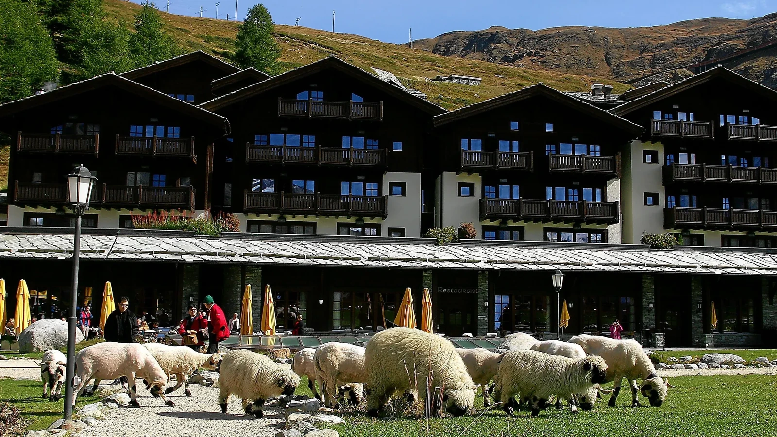 Riffelalp Resort 2222m buildings in the snowy Alpine landscape above Zermatt