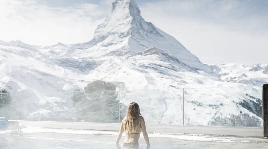 Winter pool experience beneath the Matterhorn for a stay at Riffelalp Resort 2222m