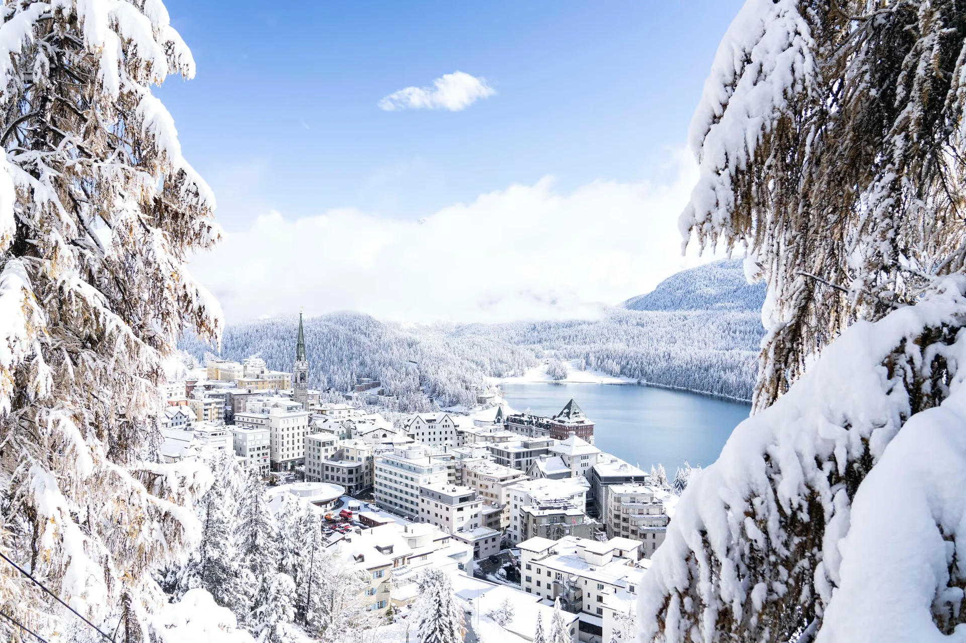 Snow-covered St. Moritz and Lake St. Moritz in the Swiss Engadin