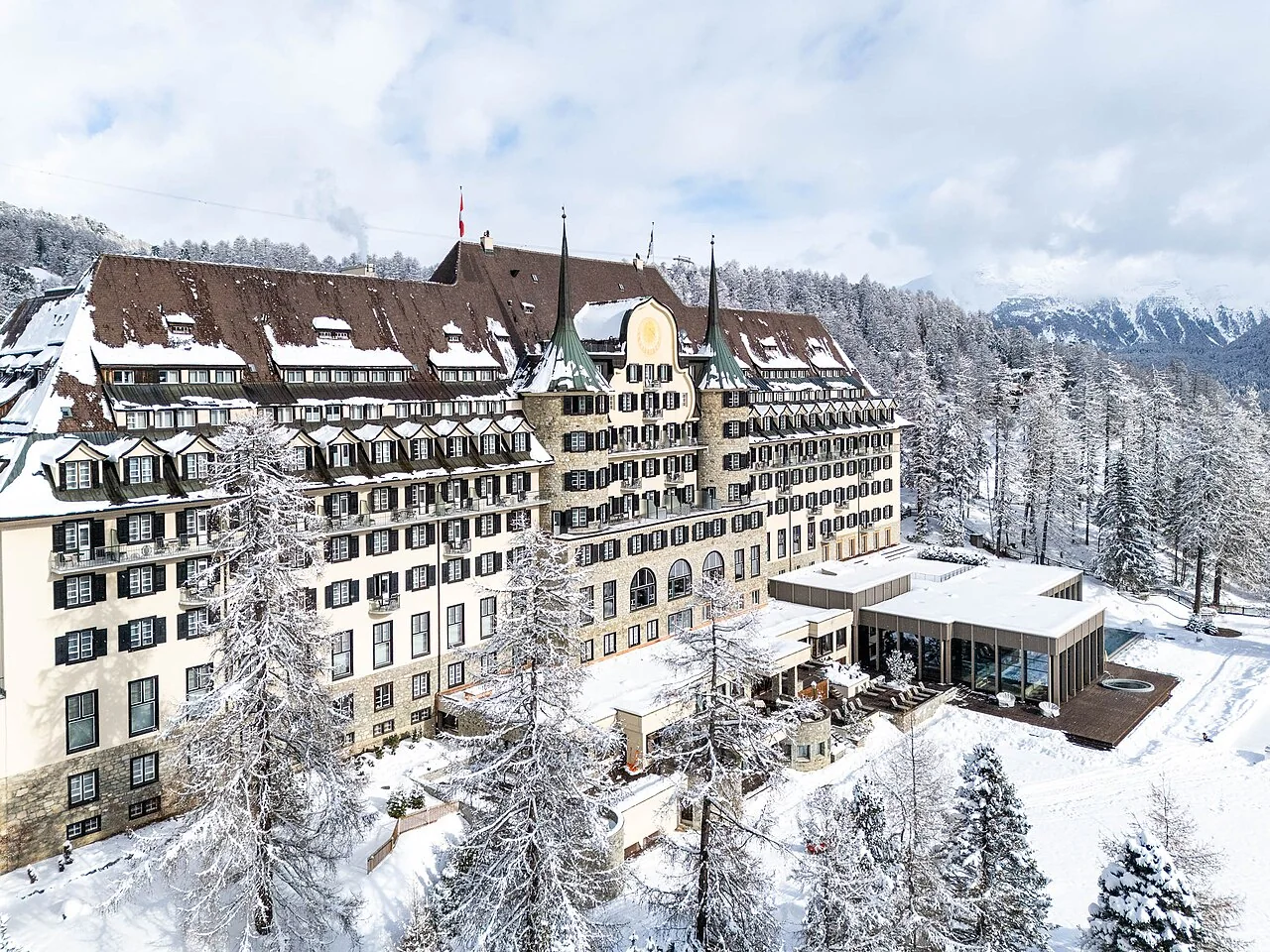 Suvretta House in St. Moritz in the winter landscape of the Engadin