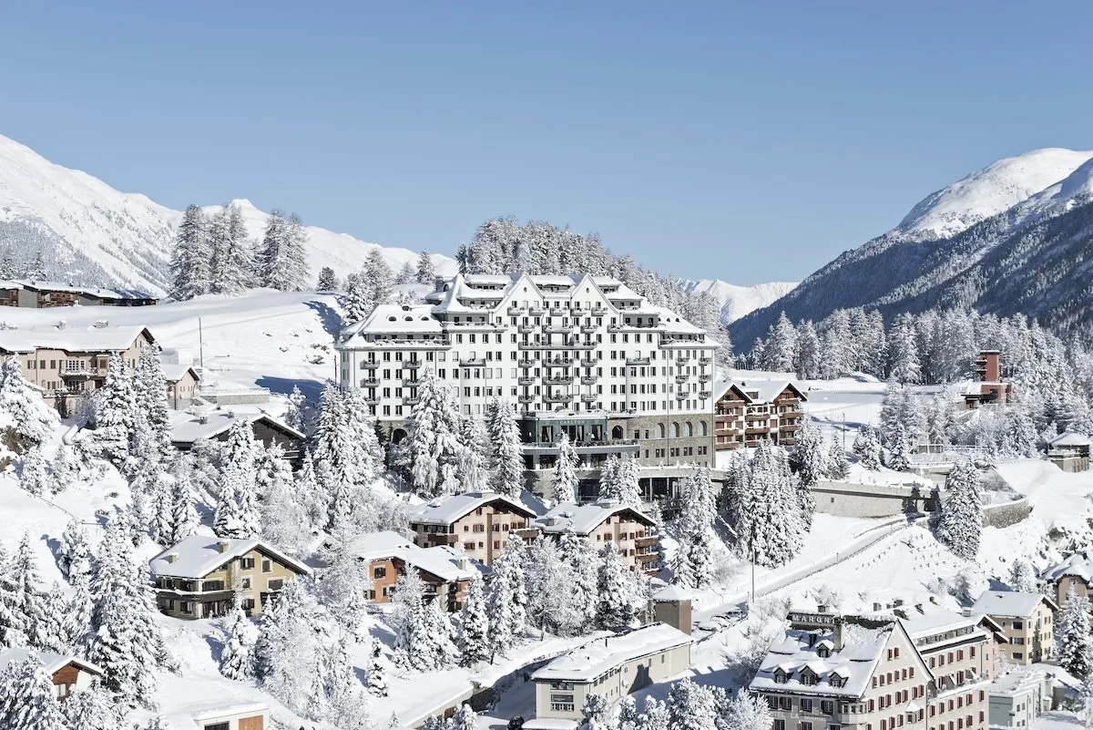 Tschuggen Grand Hotel in Arosa surrounded by snow-covered Alpine mountains